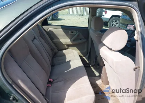 1999 Toyota Camry Ce/Le/Xle z USA, uszkodzony, nr VIN 4T1BG22K6XU523763